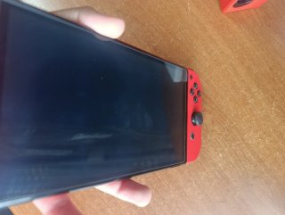 Impeccabile Nintendo Switch OLED Edizione Mario