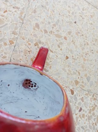 Tetera de barro roja