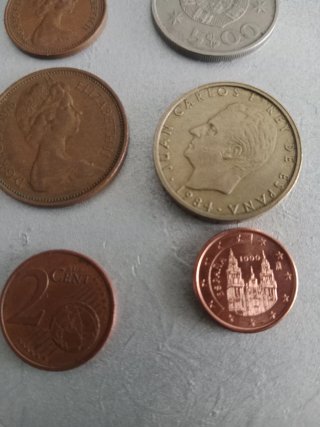 9 monedas colección distintos países del mundo.