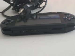 Sony PSP  Negra + Cargador + Juego
