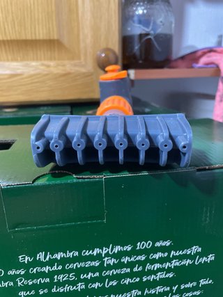 Limpia filtros piscina gris y naranja