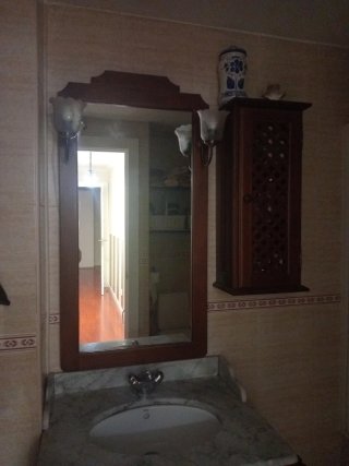 Muebles de baño de madera estilo rustico.