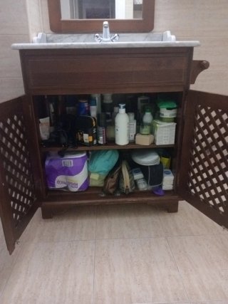 Muebles de baño de madera estilo rustico.