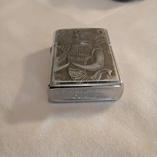 Accendino Zippo vintage con custodia in pelle