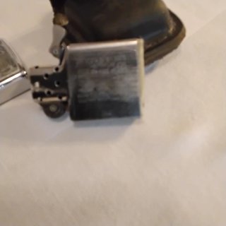 Accendino Zippo vintage con custodia in pelle