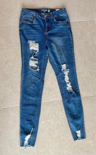 Lote de 5 pantalones vaqueros elásticos. T 36.