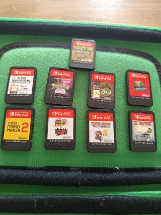 Funda Nintendo Switch + 9 Juegos