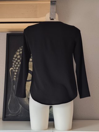 Blusa asimétrica manga larga. Moda. T. 40
