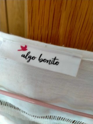 Blusón blanco holgado con cordones