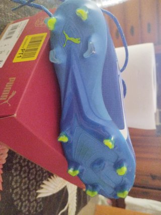 Zapatillas de fútbol Puma azules y verdes