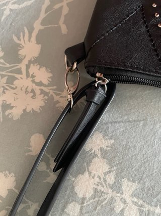 Bolso MSK negro con tachuelas