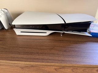 Consola PlayStation 5 con 2 mandos y juegos
