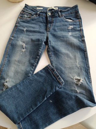 Pantalón vaquero mujer desgastado