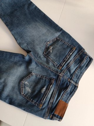 Pantalón vaquero mujer desgastado