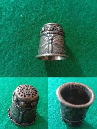 Dos dedales antiguos de plata