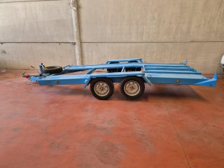 Remolque batea porta vehículos azul