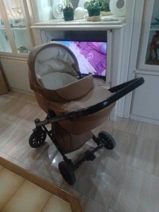 Carro de bebé con capazo y funda