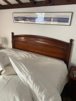 Cabecero de madera maciza estilo curvo
