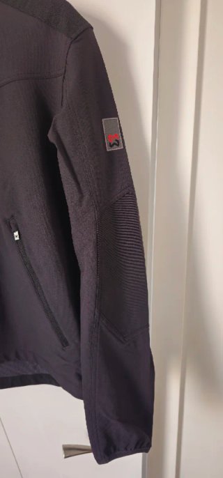 Chaqueta Stretch Evolution Negra y Verde