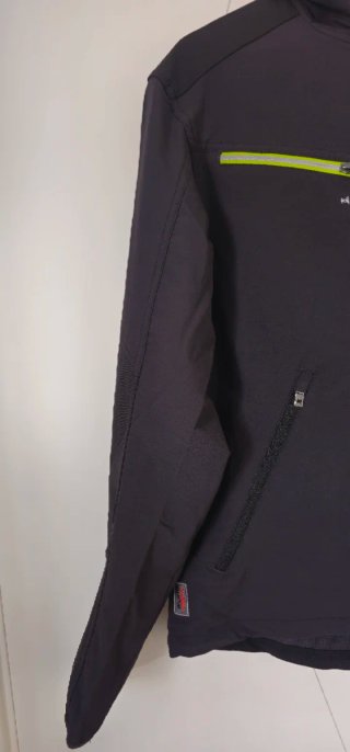 Chaqueta Stretch Evolution Negra y Verde