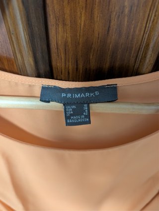 Blusa naranja sin mangas