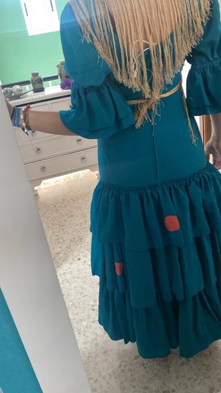 Traje de flamenca con volantes y lunares