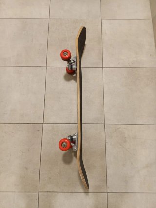 Patinete con bolsa de regalo