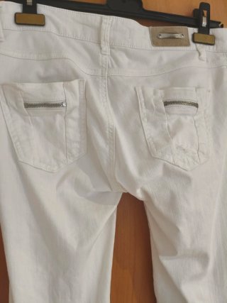 Vaqueros pitillo blancos rotos