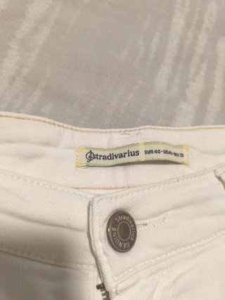 Vaqueros pitillo blancos rotos