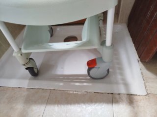 Silla de ducha con ruedas