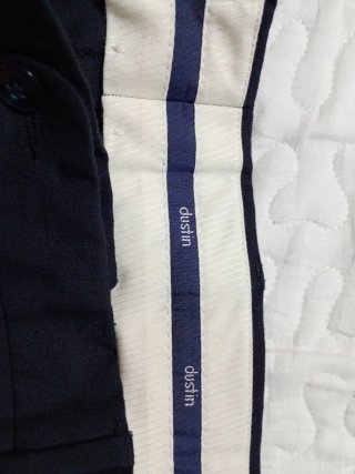Pantalón de traje con pinzas para hombre