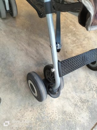 Carrito de paseo marrón y rosa