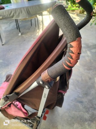 Carrito de paseo marrón y rosa
