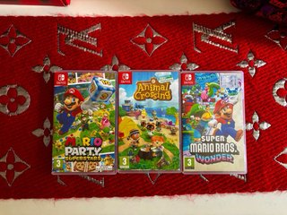 Nintendo Switch + 4 Juegos + Fundas