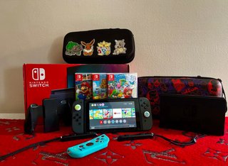 Nintendo Switch + 4 Juegos + Fundas