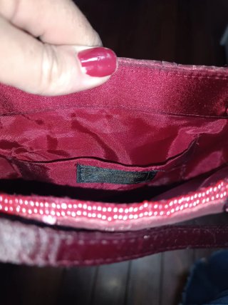 Bolso de fiesta Menbur granate.