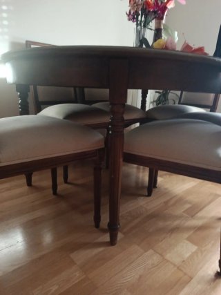 Mesa de comedor redonda de madera y 6 sillas