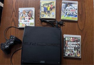 PlayStation 3 Nera + 4 Giochi