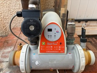 Intercambiador calor Zodiac con bomba recirculacio