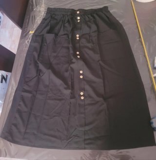 Falda larga negra con bolsillos estilo boho casual