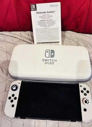 Nintendo Switch OLED Bianca + Giochi