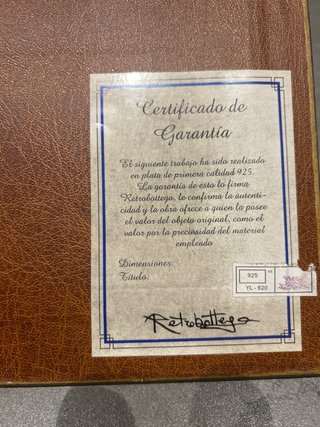Pareja cuadros repujados plata