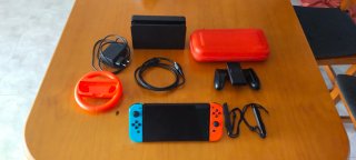 Nintendo Switch OLED + Funda + Volante + Dock
