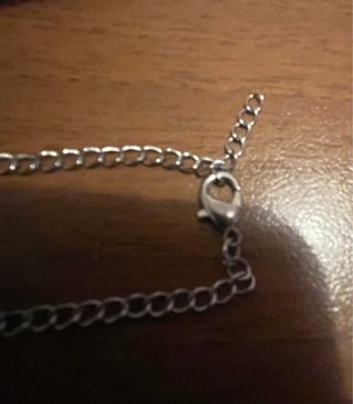 Braccialetto con ciondolo a cuore in metallo