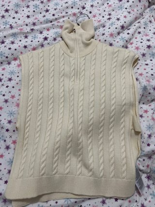Jersey sin mangas beige con cremallera