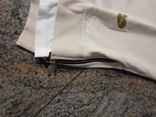 Maglietta beige con zip laterali