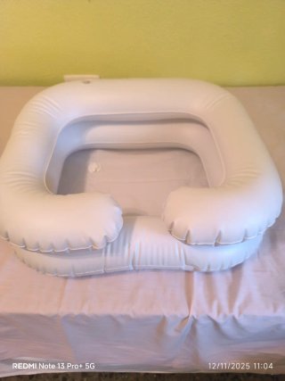 Lavacabezas hinchable para cama