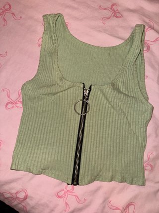 Top corto verde con cremallera
