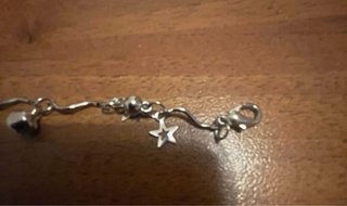 Braccialetto metallo con pendenti stelle