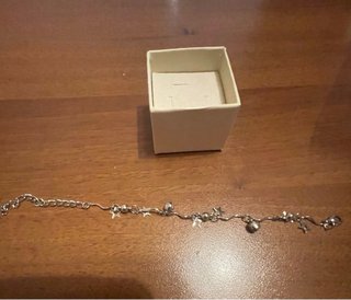 Braccialetto metallo con pendenti stelle